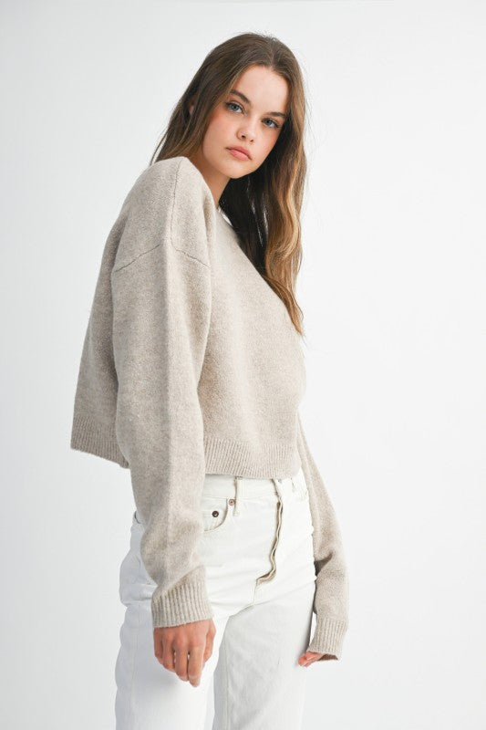 Bow & Tell Reversible Knit Sweater