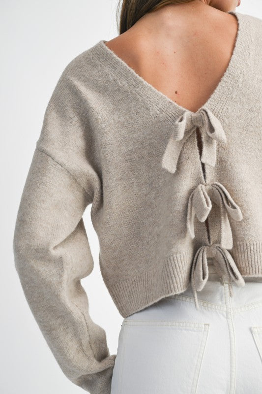 Bow & Tell Reversible Knit Sweater
