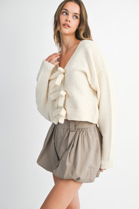 Bow & Tell Reversible Knit Sweater