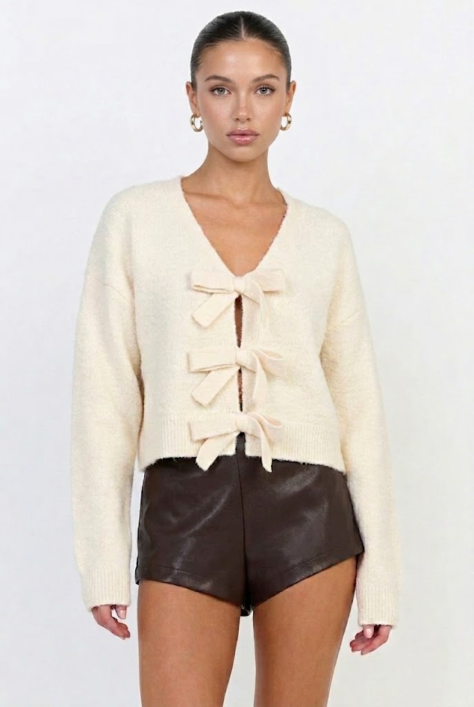 Bow & Tell Reversible Knit Sweater