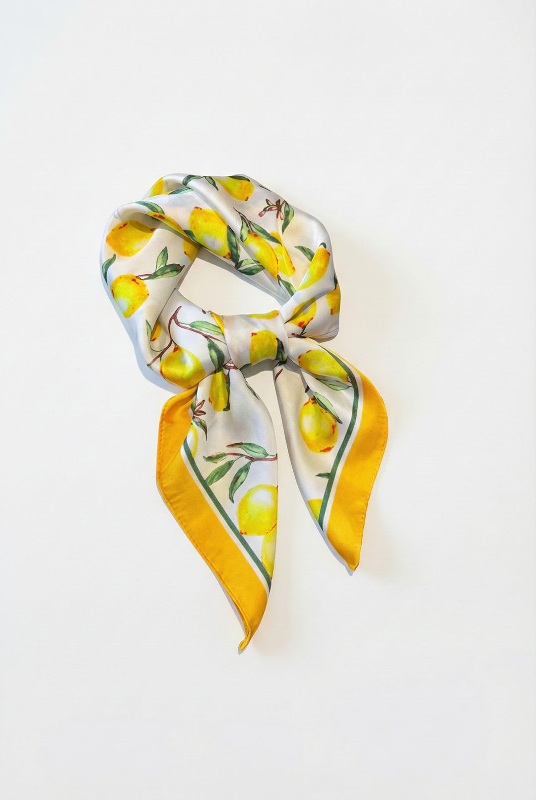 Silk scarf with lemon pattern on a white background