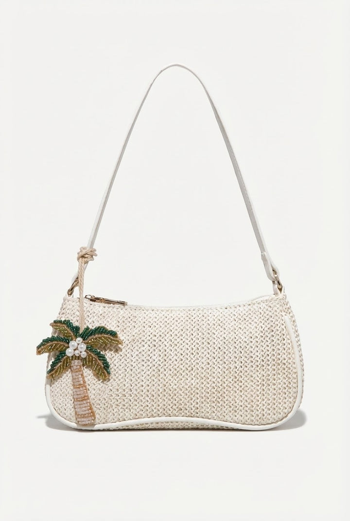 Woven handbag with palm tree design on a white background