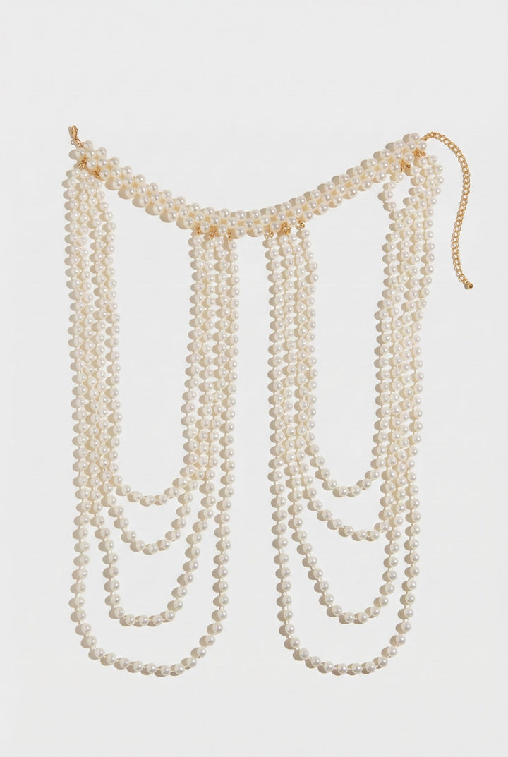 Long pearl necklace on a white background